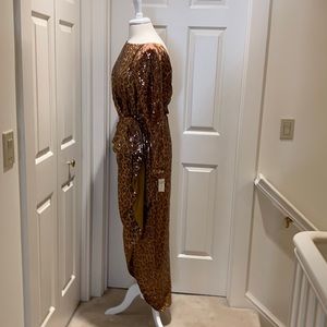 Vintage 70’s sequins dress Size 6. Front is draped to show leg. Light Brown.